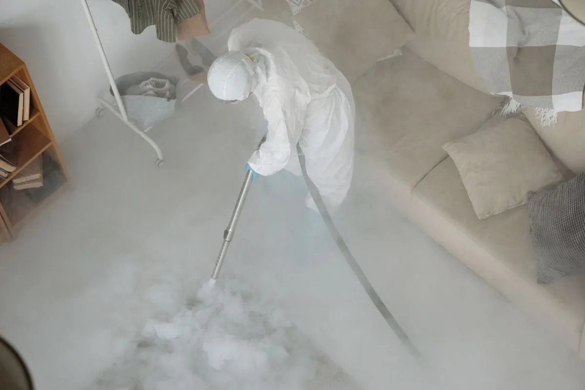 Biohazard cleanup technician in protective equipment, Egypt Lake-Leto, FL